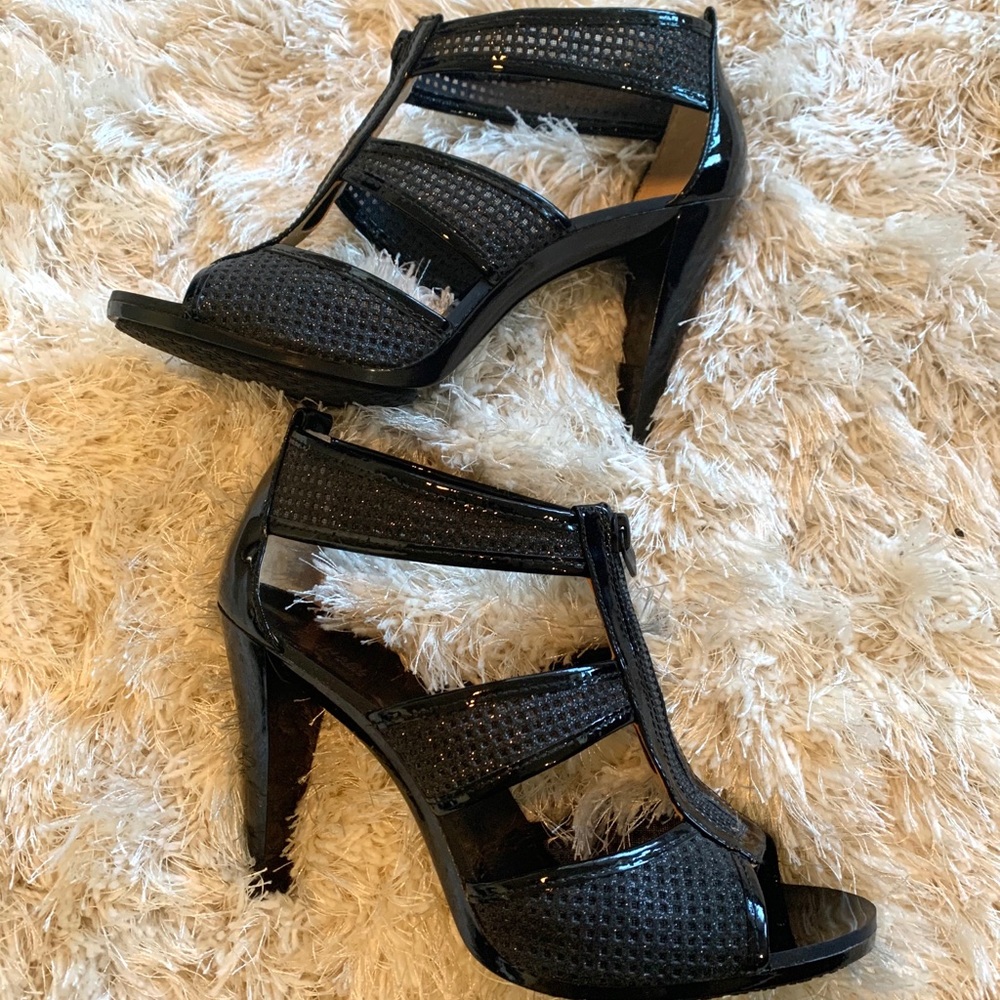 Black Michael Kors zipper front heels